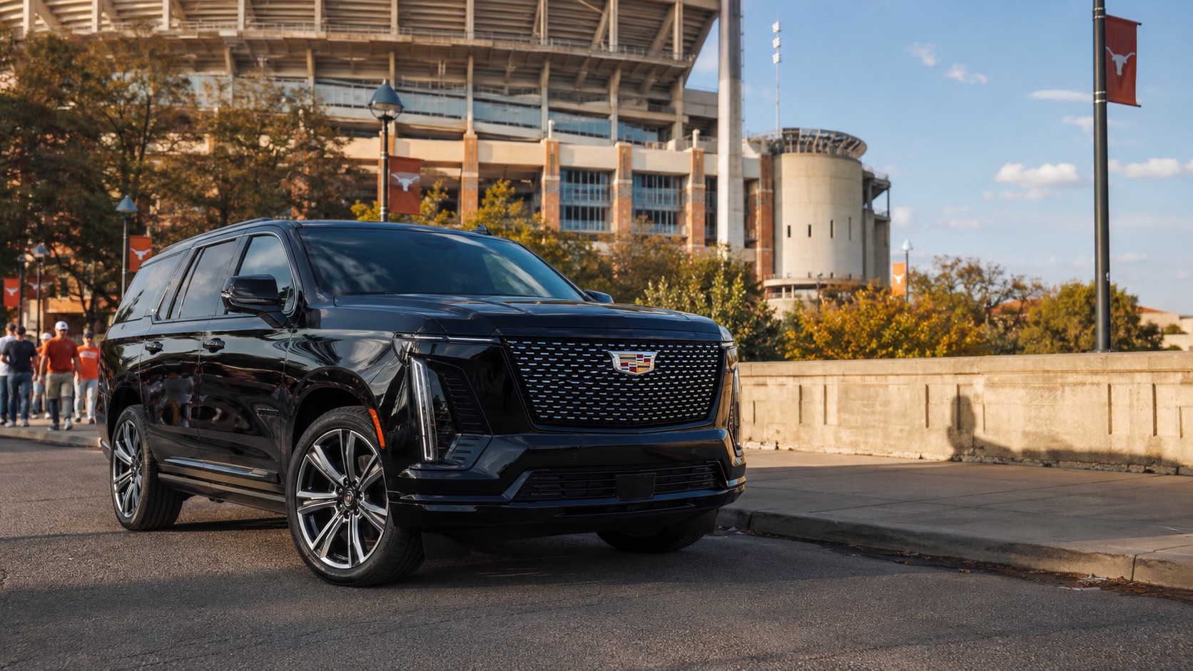 Black Cadillac Escalade chauffeur SUV outside DKR Stadium on a Longhorn football game day in Austin